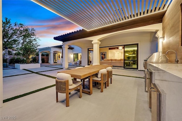 11906 Port Labelle Dr, Las Vegas, NV 89141 - view of patio featuring an outdoor kitchen and outdoor dining space