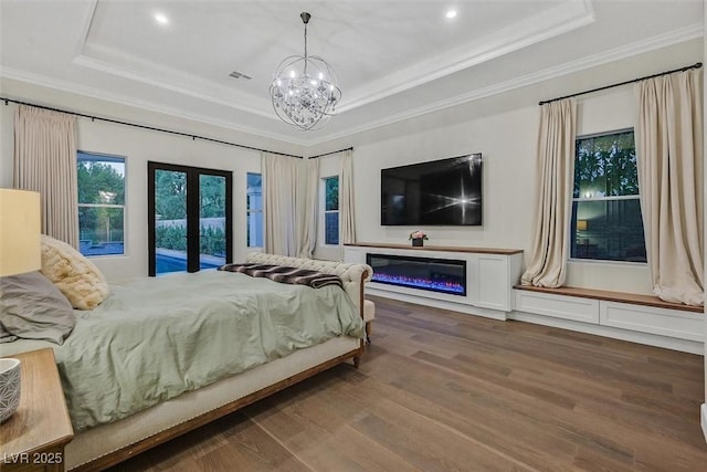 11906 Port Labelle Dr, Las Vegas, NV 89141 - bedroom with a raised ceiling, crown molding, a chandelier, french doors, and wood finished floors
