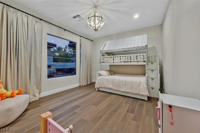 11906 Port Labelle Dr, Las Vegas, NV 89141 - bedroom with a chandelier, wood finished floors, and recessed lighting