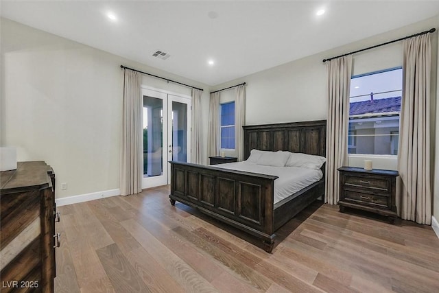 11906 Port Labelle Dr, Las Vegas, NV 89141 - bedroom featuring french doors, access to outside, light wood-style flooring, and recessed lighting