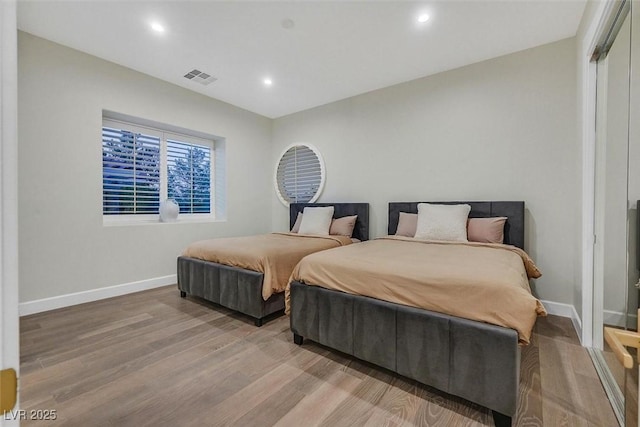11906 Port Labelle Dr, Las Vegas, NV 89141 - bedroom featuring light wood finished floors and recessed lighting