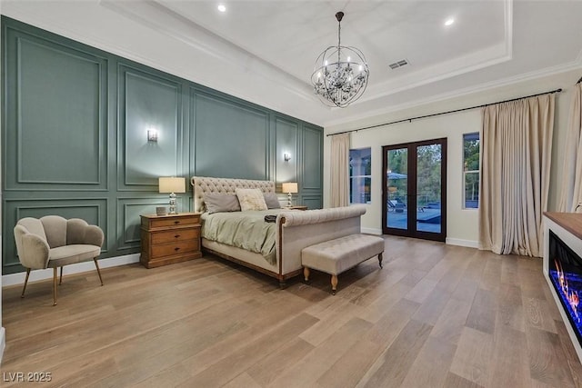 11906 Port Labelle Dr, Las Vegas, NV 89141 - bedroom with a decorative wall, access to outside, french doors, a chandelier, and light wood-style floors