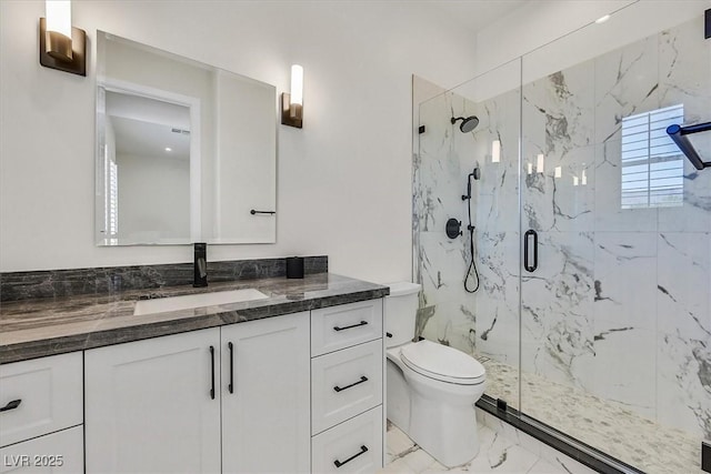 11906 Port Labelle Dr, Las Vegas, NV 89141 - bathroom with marble look tile flooring, a marble finish shower, and vanity