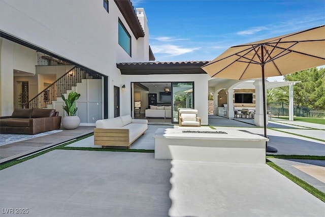 11906 Port Labelle Dr, Las Vegas, NV 89141 - view of patio / terrace with an outdoor living space and stairs
