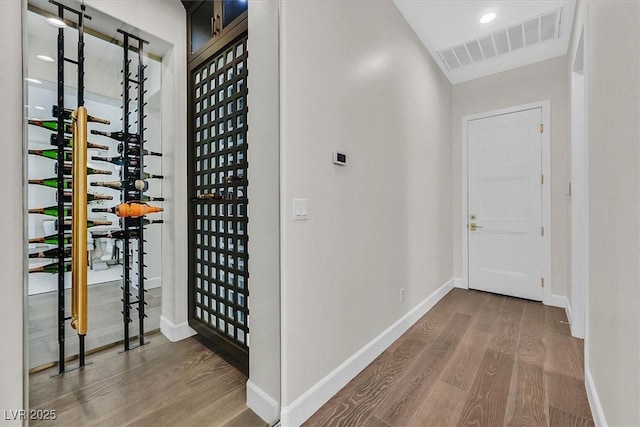 11906 Port Labelle Dr, Las Vegas, NV 89141 - wine area featuring wood finished floors and baseboards
