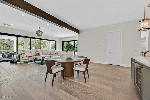 11906 Port Labelle Dr, Las Vegas, NV 89141 - dining room with light wood-style floors, beamed ceiling, recessed lighting, and a chandelier