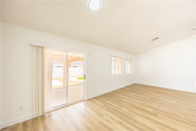 2403 Sexton Ave, North Las Vegas, NV 89031 - spare room featuring plenty of natural light and light wood-style flooring