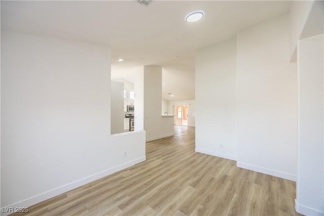 2403 Sexton Ave, North Las Vegas, NV 89031 - spare room featuring light wood-style flooring and recessed lighting