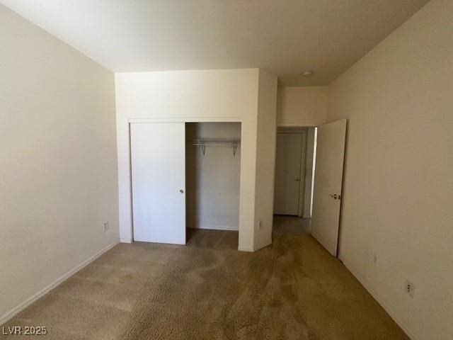 5147 Progresso St, Las Vegas, NV 89135 - unfurnished bedroom with carpet flooring and a closet