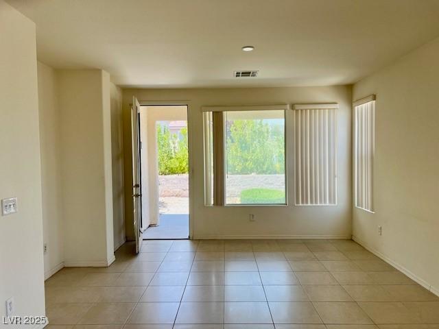 5147 Progresso St, Las Vegas, NV 89135 - unfurnished room featuring light tile patterned floors and baseboards