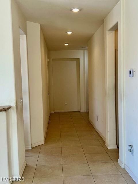 5147 Progresso St, Las Vegas, NV 89135 - hallway with light tile patterned flooring and recessed lighting