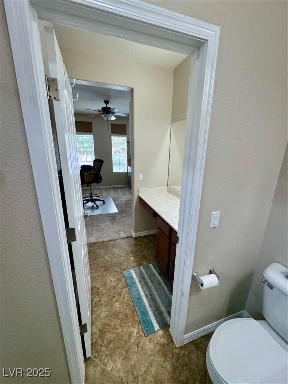 6614 Collingsworth St, Las Vegas, NV 89131 - bathroom with vanity and ceiling fan