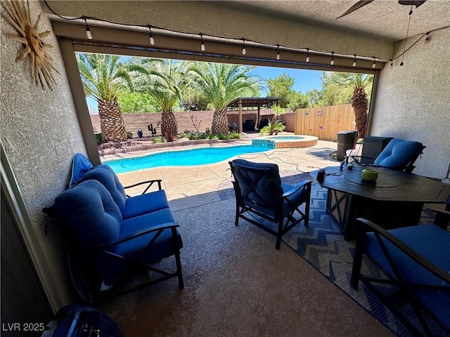 6614 Collingsworth St, Las Vegas, NV 89131 - view of pool with a fenced backyard, a patio, and a pool with connected hot tub