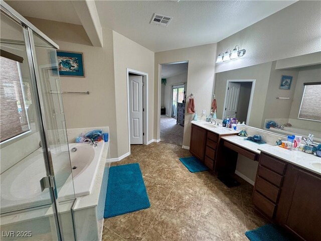 6614 Collingsworth St, Las Vegas, NV 89131 - bathroom with vanity, a bath, and a stall shower