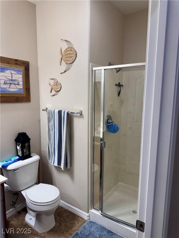6614 Collingsworth St, Las Vegas, NV 89131 - bathroom featuring a stall shower and tile patterned flooring
