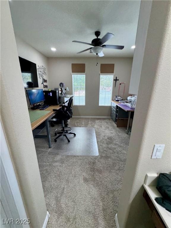 6614 Collingsworth St, Las Vegas, NV 89131 - carpeted home office with ceiling fan and baseboards
