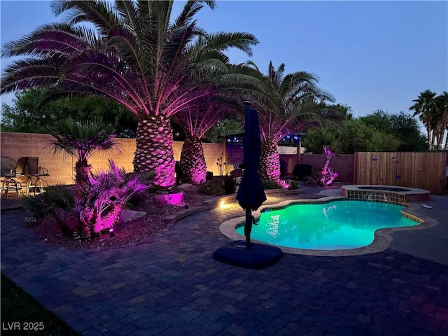 6614 Collingsworth St, Las Vegas, NV 89131 - view of swimming pool with a patio, a fenced backyard, and a pool with connected hot tub