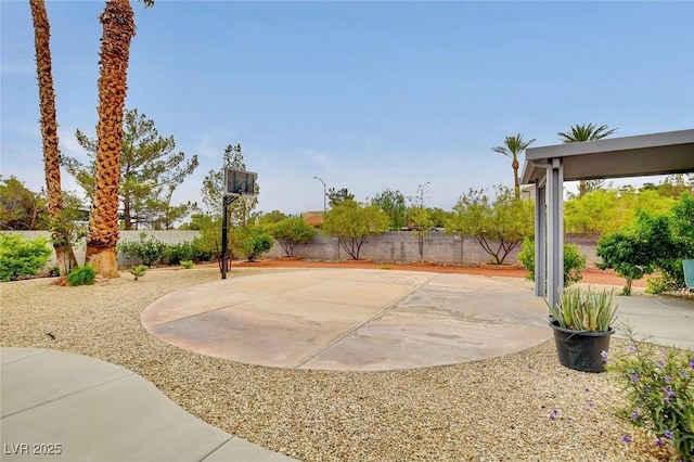 1970 Del Font Ct, Las Vegas, NV 89117 - fenced backyard featuring basketball court