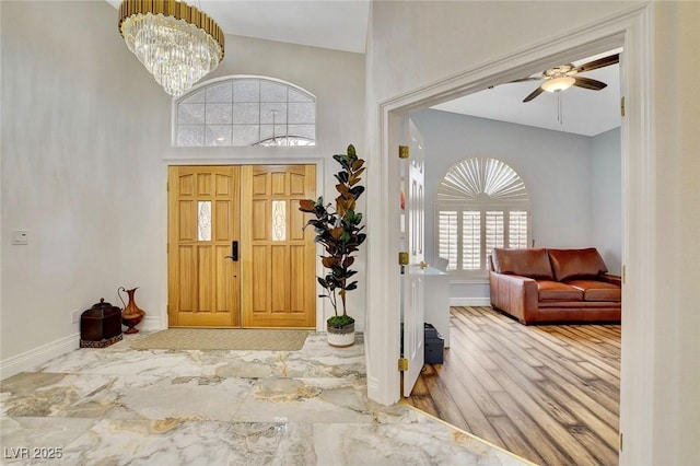 1970 Del Font Ct, Las Vegas, NV 89117 - foyer entrance featuring a ceiling fan, a towering ceiling, and wood finished floors