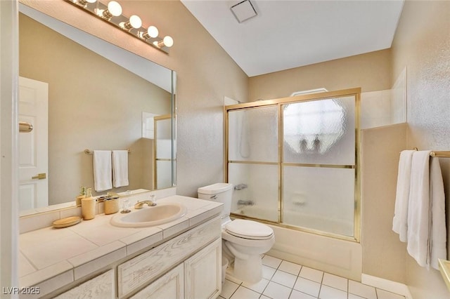 1970 Del Font Ct, Las Vegas, NV 89117 - full bath featuring vanity, enclosed tub / shower combo, tile patterned flooring, and a textured wall