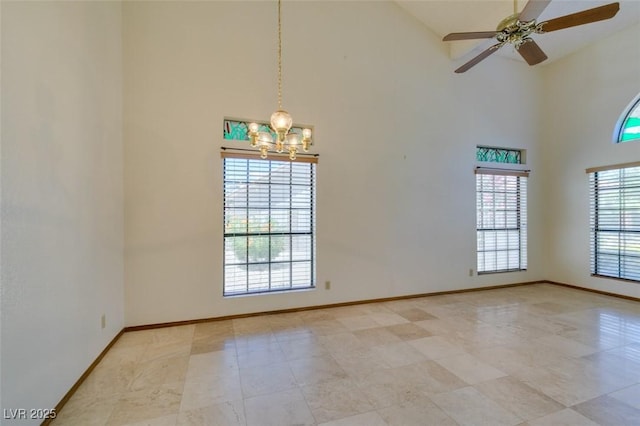 5505 Excelsior Springs Ln, Las Vegas, NV 89130 - spare room featuring high vaulted ceiling, a chandelier, and ceiling fan