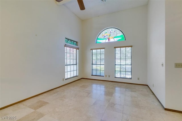 5505 Excelsior Springs Ln, Las Vegas, NV 89130 - empty room with a ceiling fan and high vaulted ceiling