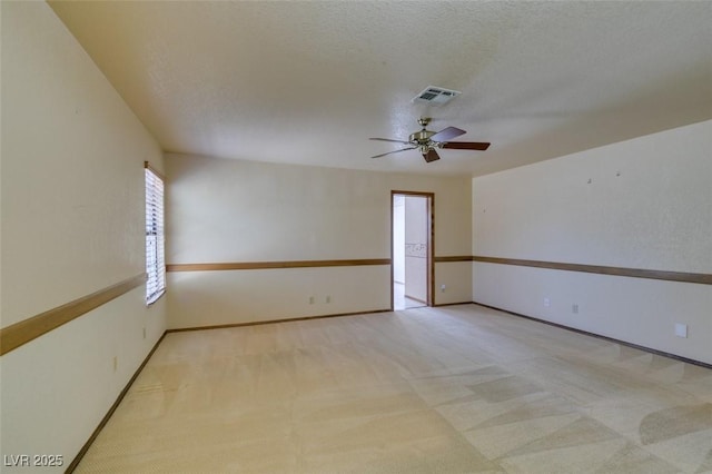5505 Excelsior Springs Ln, Las Vegas, NV 89130 - unfurnished room with a ceiling fan, carpet, and a textured ceiling