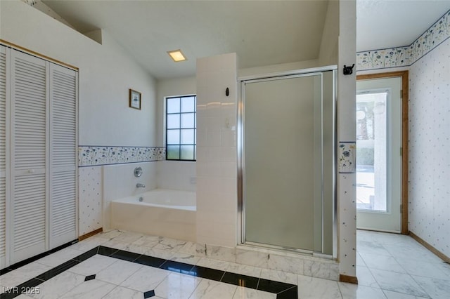 5505 Excelsior Springs Ln, Las Vegas, NV 89130 - bathroom with a closet, a garden tub, wallpapered walls, and a stall shower