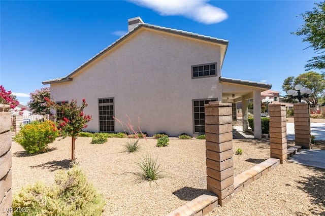 5505 Excelsior Springs Ln, Las Vegas, NV 89130 - view of home's exterior featuring stucco siding