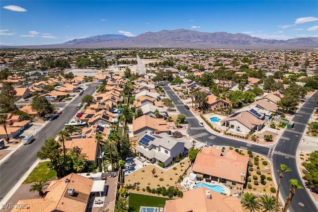 5505 Excelsior Springs Ln, Las Vegas, NV 89130 - aerial view of property and surrounding area featuring nearby suburban area and a mountainous background