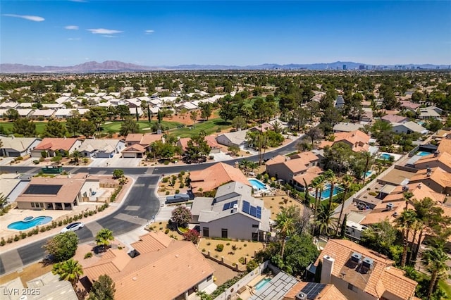 5505 Excelsior Springs Ln, Las Vegas, NV 89130 - aerial view of residential area with mountains and a pool area