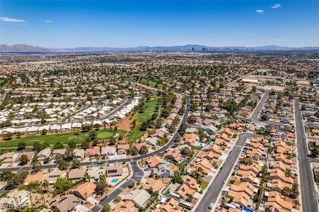 5505 Excelsior Springs Ln, Las Vegas, NV 89130 - aerial overview of property's location featuring a mountainous background and nearby suburban area