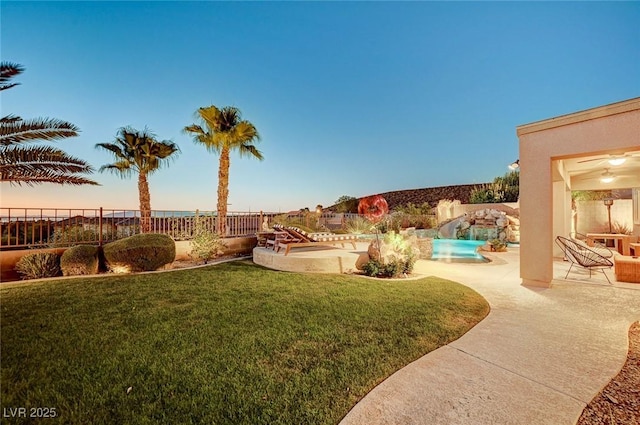 2172 De Rouge Ave, Henderson, NV 89044 - fenced backyard featuring a patio and a pool