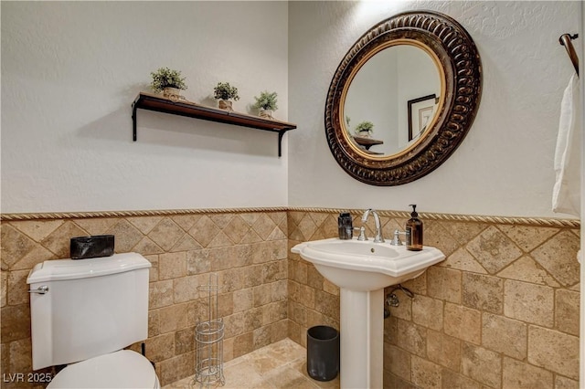 2172 De Rouge Ave, Henderson, NV 89044 - half bath with tile walls and wainscoting
