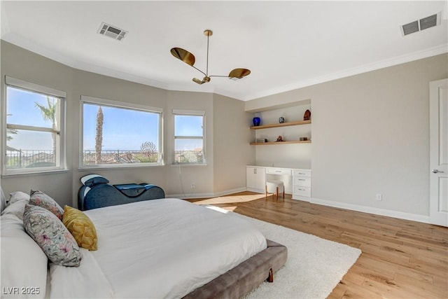 2172 De Rouge Ave, Henderson, NV 89044 - bedroom with ornamental molding, multiple windows, and wood finished floors