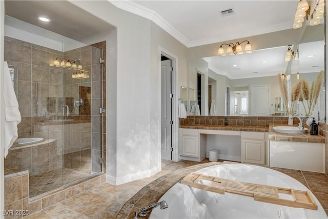 2172 De Rouge Ave, Henderson, NV 89044 - bathroom with a garden tub, vanity, ornamental molding, a shower stall, and tile patterned floors