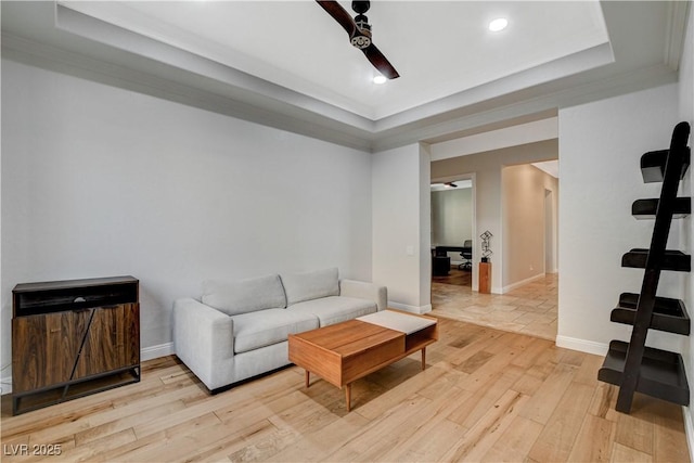 2172 De Rouge Ave, Henderson, NV 89044 - living area featuring a raised ceiling, light wood-style floors, recessed lighting, and ceiling fan