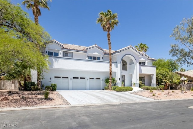 2209 Purple Majesty Ct, Las Vegas, NV 89117 - view of front of home featuring stucco siding, an attached garage, and driveway