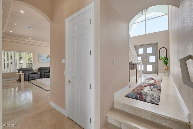 2209 Purple Majesty Ct, Las Vegas, NV 89117 - entryway with arched walkways, recessed lighting, and a high ceiling