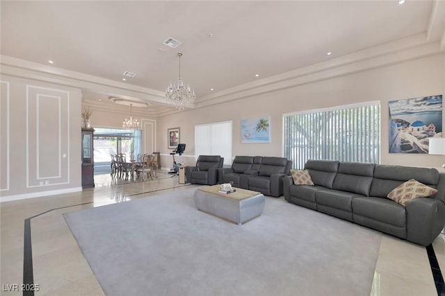 2209 Purple Majesty Ct, Las Vegas, NV 89117 - tiled living room featuring a raised ceiling, a chandelier, inlaid floor details, and recessed lighting