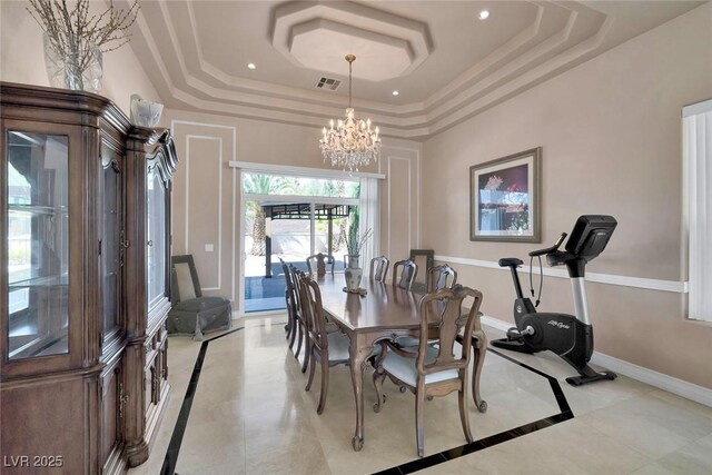2209 Purple Majesty Ct, Las Vegas, NV 89117 - dining area with a tray ceiling, a chandelier, recessed lighting, inlaid floor details, and light tile patterned floors