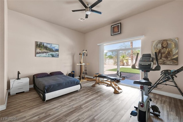 2209 Purple Majesty Ct, Las Vegas, NV 89117 - bedroom with wood finished floors, access to exterior, and ceiling fan