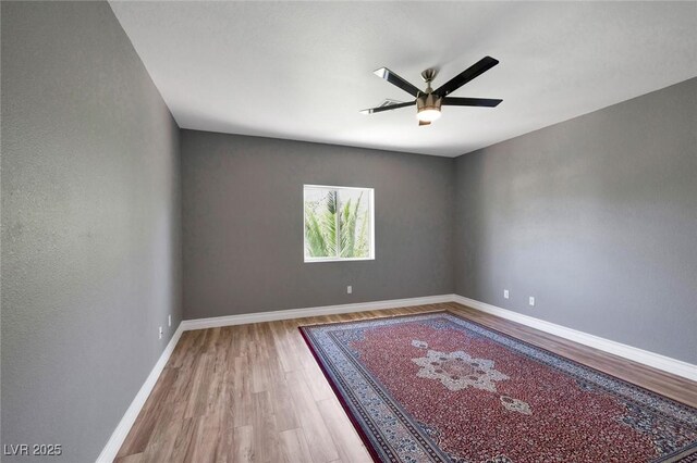 2209 Purple Majesty Ct, Las Vegas, NV 89117 - spare room with wood finished floors and a ceiling fan