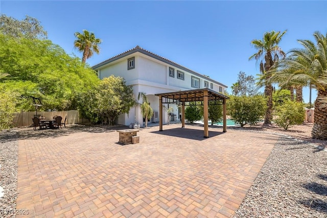 2209 Purple Majesty Ct, Las Vegas, NV 89117 - view of patio featuring an outdoor fire pit and a gazebo