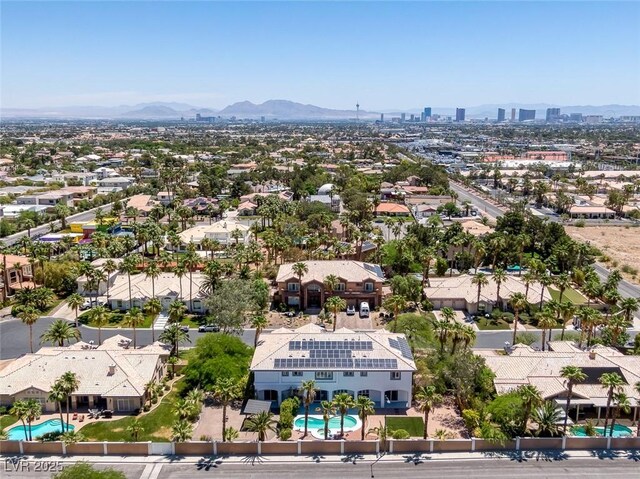 2209 Purple Majesty Ct, Las Vegas, NV 89117 - aerial perspective of suburban area with a pool and a mountainous background