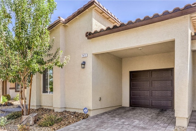 7472 Garnet Moon St, North Las Vegas, NV 89084 - garage featuring decorative driveway