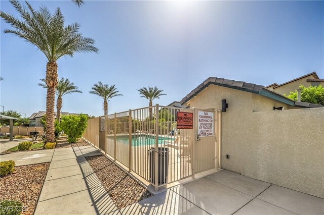 7472 Garnet Moon St, North Las Vegas, NV 89084 - view of patio / terrace with a community pool