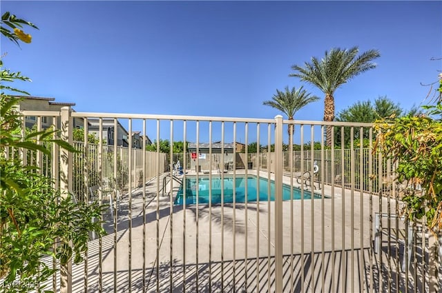 7472 Garnet Moon St, North Las Vegas, NV 89084 - community pool featuring a patio area