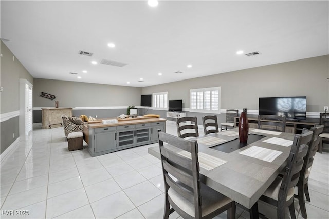 7215 Ullom Dr, Las Vegas, NV 89118 - dining space featuring recessed lighting and light tile patterned floors