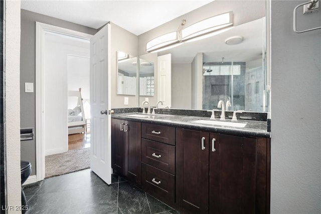 7215 Ullom Dr, Las Vegas, NV 89118 - bathroom with double vanity and a stall shower